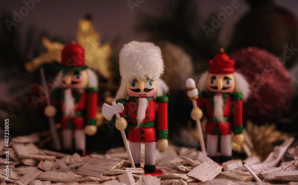 Obraz Christmas decorations - the nutcracker and, on the background of decorations.