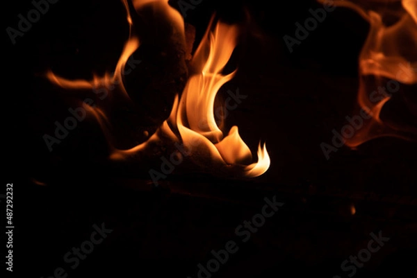 Fototapeta flames on a black backkground