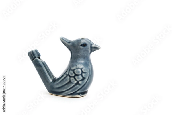 Fototapeta Porcelain whistle form bird, children toy on white background.