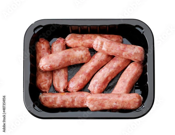 Obraz mini smoked sausages in plastic tray isolated on white
