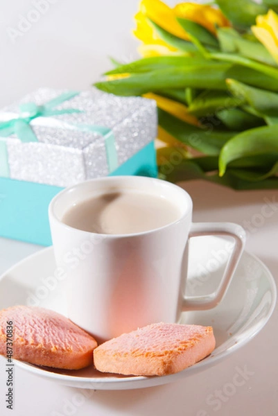 Obraz Yellow tulips, a surprise box and a cup of espresso. Romantic evening