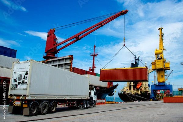 Fototapeta General cargo shipments in the port terminal are working busy congestion in yard of the port, the loading discharging bulk and steel shipment are in logistics transports of the sea and land meeting