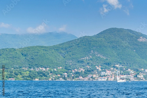 Fototapeta Scenic panoramic landscape view on Bay of Kotor, Montenegro with mountains at sundown.