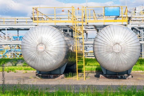 Fototapeta Two gas processing plant tanks .