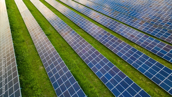 Fototapeta Top view of solar panels on a sunny summer day in Europe