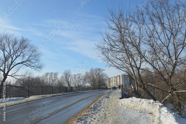 Fototapeta snow covered road