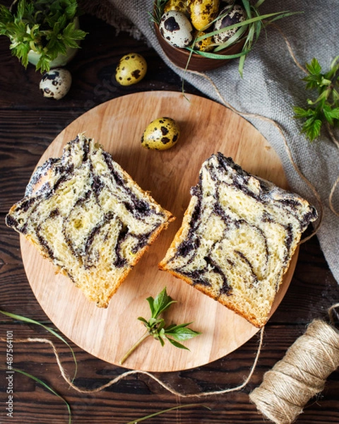 Obraz Easter cupcakes. Painted eggs. Easter still life. Panettone with poppy seeds