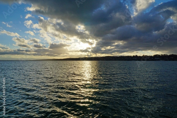 Fototapeta sundown with clouds on lake starnberg bavaria near munich