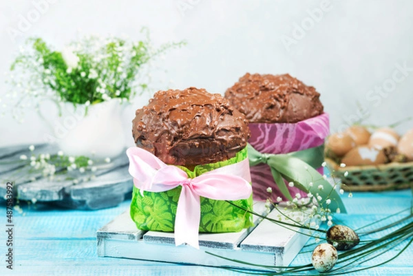 Obraz Easter cakes. Painted eggs. Easter background. Spring still life. Panettone with chocolate. 