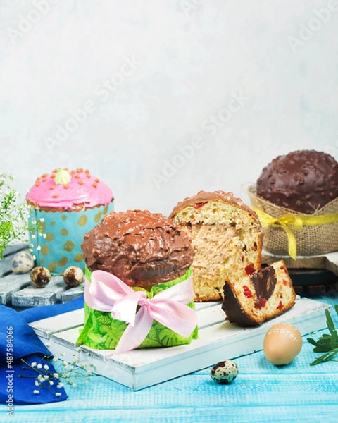 Obraz Easter cakes. Painted eggs. Easter background. Spring still life. Panettone with chocolate. 