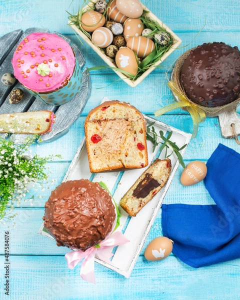 Obraz Easter cakes. Painted eggs. Easter background. Spring still life. Panettone with chocolate. 