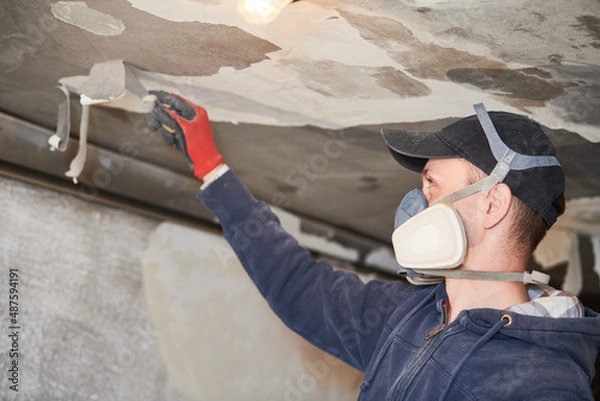 Obraz fire damage and restoration indoor interior. removing damaged paint layer