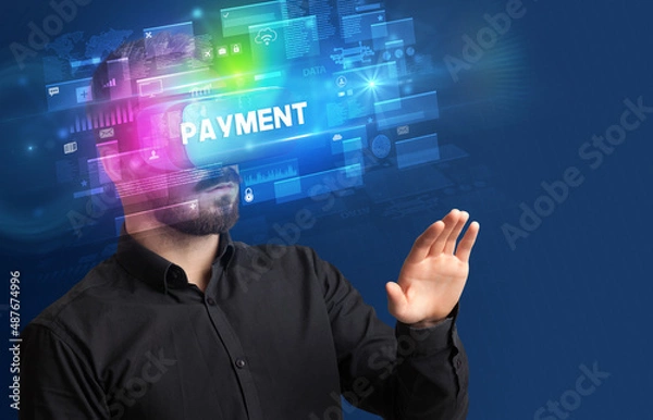 Fototapeta Businessman looking through Virtual Reality glasses