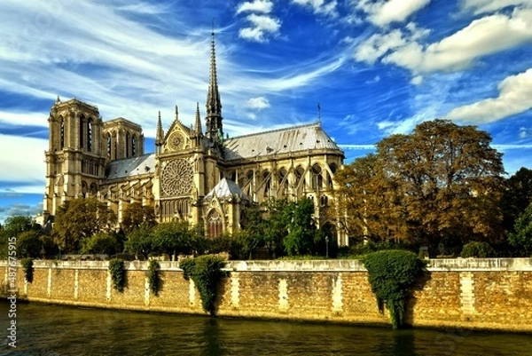 Obraz Cathedral of Notre-Dame in Paris feather clouds blue sky