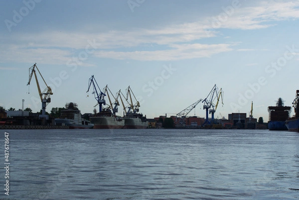 Fototapeta The ship is moored on the waterfront near the shipyard, a cargo ship.