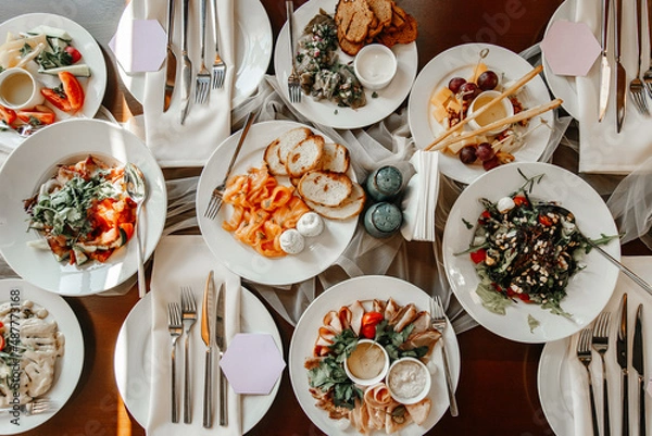 Obraz Served table in a restaurant with various snacks close-up