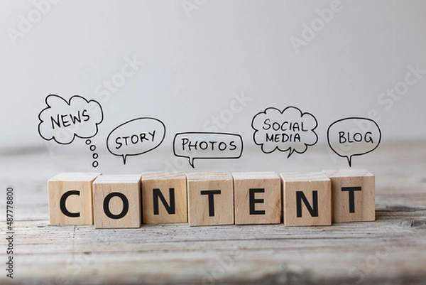 Obraz Create Content strategy Concept. Content wording on wooden cubes with speech bubbles.