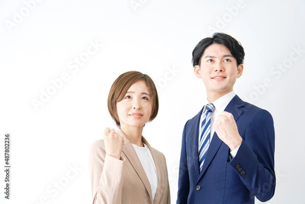 Fototapeta ビジネスウーマンとビジネスマン　ガッツポーズ　白背景