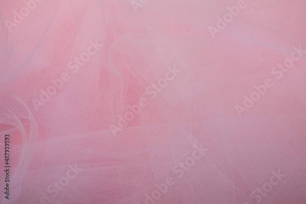 Fototapeta delicate airy white fabric with folds on a pink background