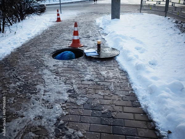 Fototapeta repair of underground communications, winter city cable laying
