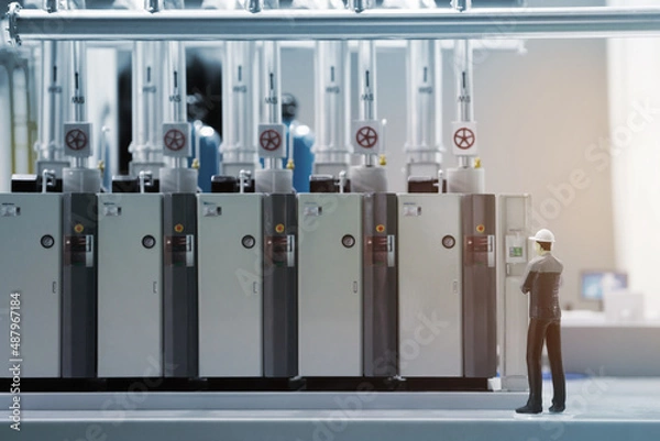 Fototapeta Maintenance Engineer checking ,inspecting at MDB panel working. Electrical engineer working with electric switchboard to check range of voltage in Main Distribution Boards at the MDB room in factory.