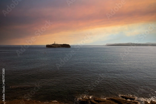 Obraz sunset over the sea with lighthouse