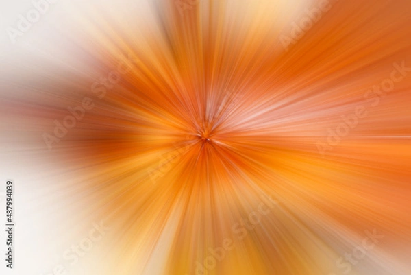 Fototapeta Golden orange motion blur, with glowing light to the left