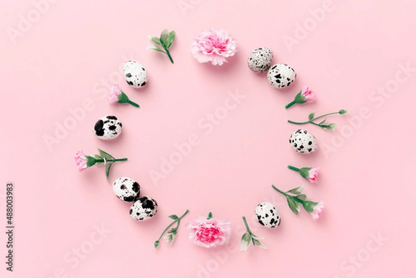 Fototapeta Easter round composition of spring herbs, eggs, and flowers on a pink pastel background. Minimal easter concept. Flat lay with copy space.