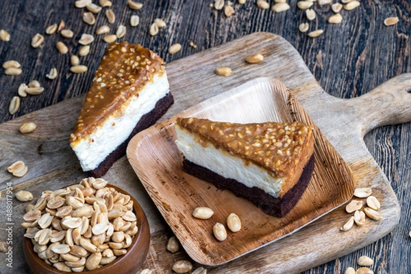 Obraz creamy chocolate cake with caramel and roasted peanuts