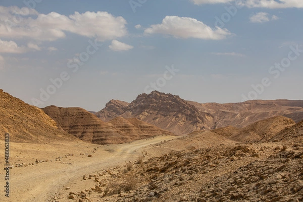 Obraz Mountains, rocks and hills of Judean desert in Israel, Middle East landmarks of Old Testament Bible times. Aerial view of Dead sea spa and recreation areas. High quality photo