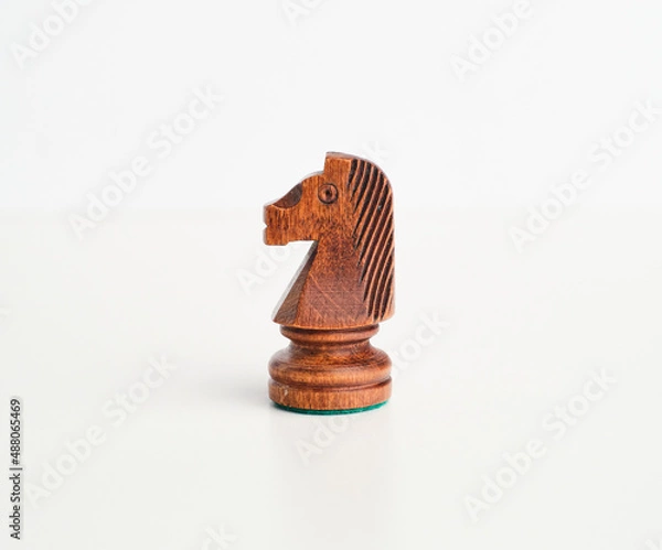 Fototapeta chess pieces on the white background, isolated