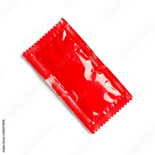 Obraz Red ketchup packets isolated on white background. object picture for graphic designer