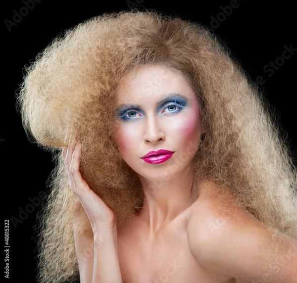 Fototapeta Young beautiful model with lush hairs