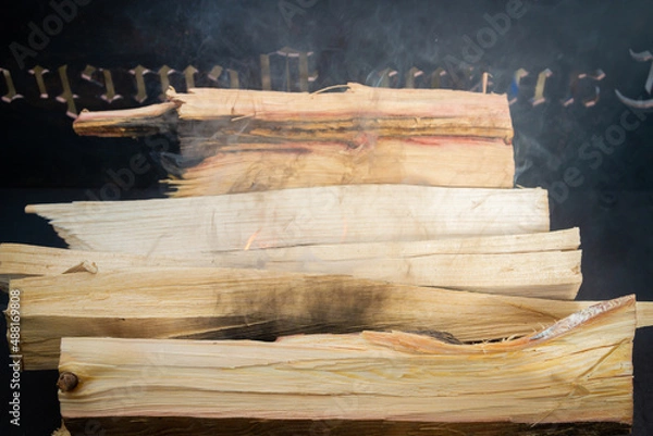 Obraz Dry wood in the grill for kindling and making coals
