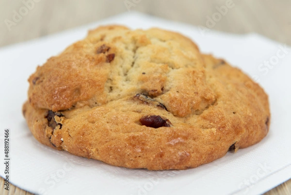 Fototapeta Cranberry and orange scone is baked to perfection and still warm from the oven and ready to eat