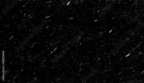Obraz Real snowfall on a black background. Falling snow on a long exposure. Snow texture to use in graphic editor to overlay your image. Banner size