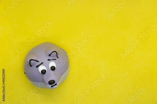 Fototapeta chocolate cookies with cream.  yellow background.  wolf