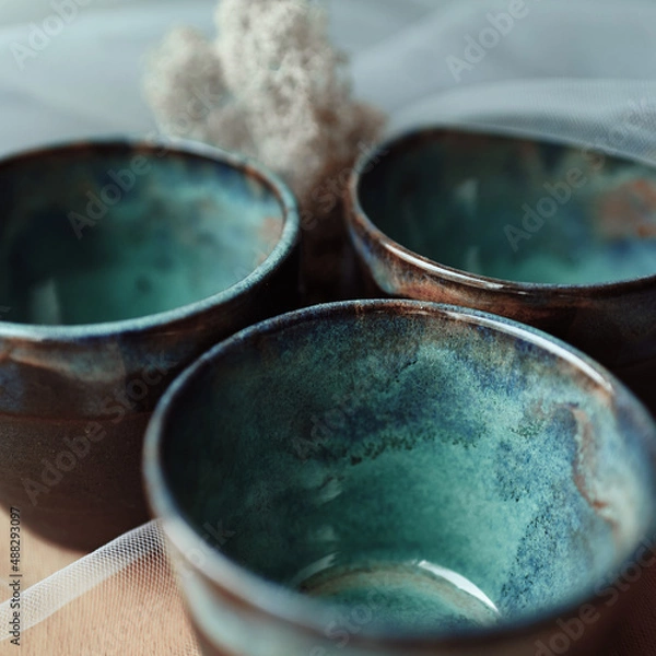 Obraz three ceramic cups in blue ocean glaze