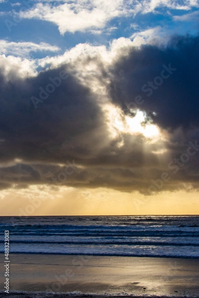 Obraz Sunset cloud formations with light rays