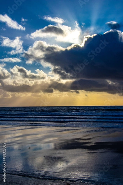 Obraz Sunset cloud formations with light rays