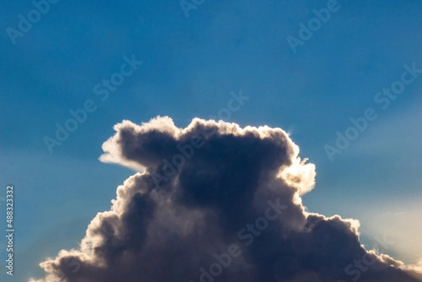 Obraz Sunset cloud formations with light rays