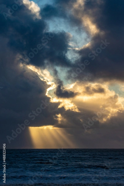 Obraz Sunset cloud formations with light rays