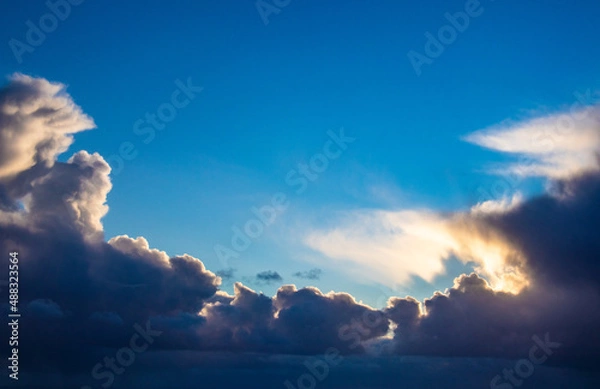 Obraz Sunset cloud formations with light rays