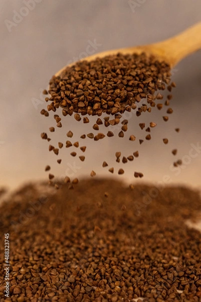 Obraz Buckwheat in a spoon.
Scattered buckwheat.