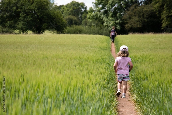 Obraz Children on a path through wheat field