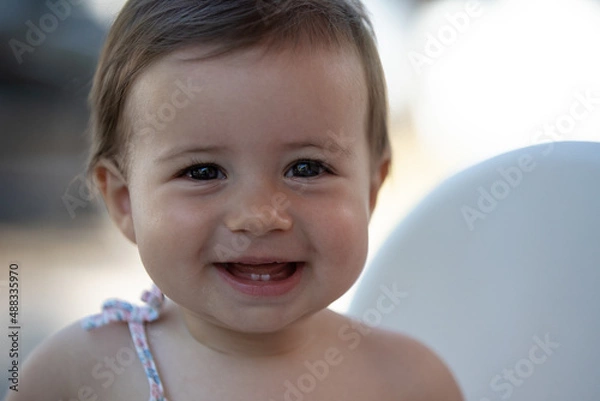 Fototapeta Portrait eines lachenden Babys