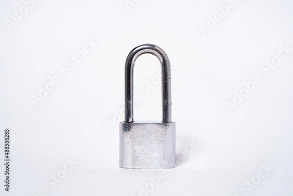Fototapeta padlock for added security, with silver color and white background