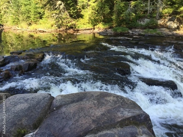 Obraz water rushing through the river