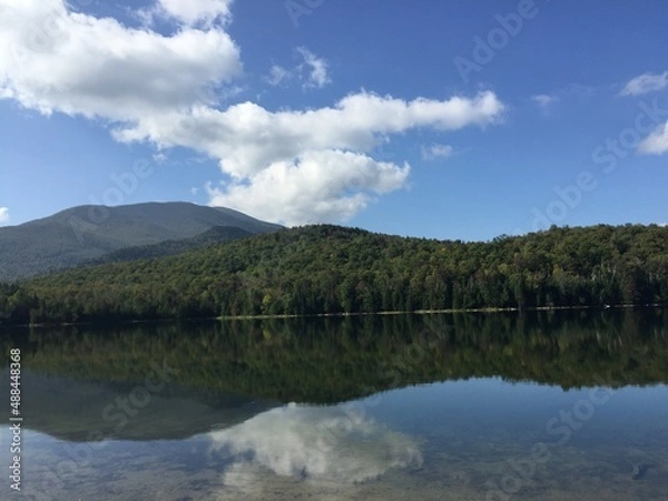 Obraz reflections of clouds in lake