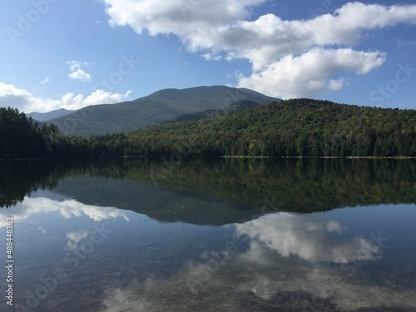 Obraz reflections of clouds in lake